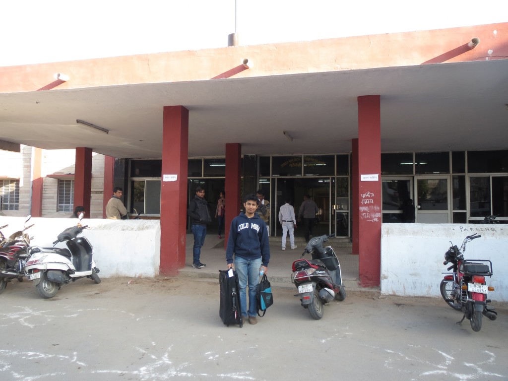 Dilan bringing bag full of donated surgical supplies to hospital