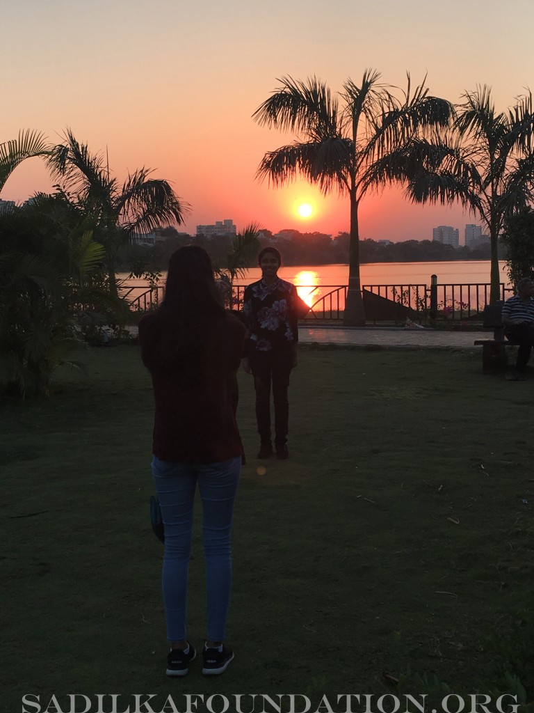 Enjoying the magnificent sunset in Narmada Park after Camp day ends.